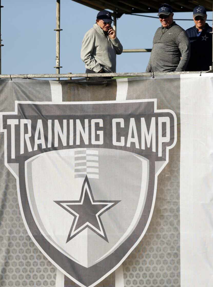 Dallas Cowboys owner Jerry Jones (left) is pictured in the field tower with his sons,...