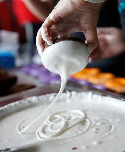 Hurts Donut, a shop that people wait in line for, produces 5,000 to 8,000 doughnuts a day....