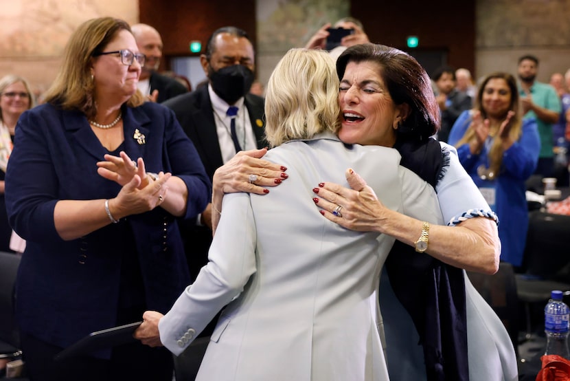 Luci Baines Johnson (right), daughter of President Lyndon B. Johnson embraces former Texas...