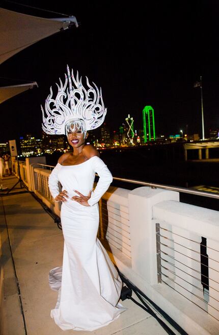 Some attendees to the 2015 Diner en Blanc wore ball gowns. Sai Sankoh went all out with a...