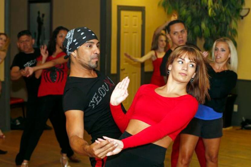 
Professional dancers Roberto Lay and Tamara Valle are salsa instructors who compete around...