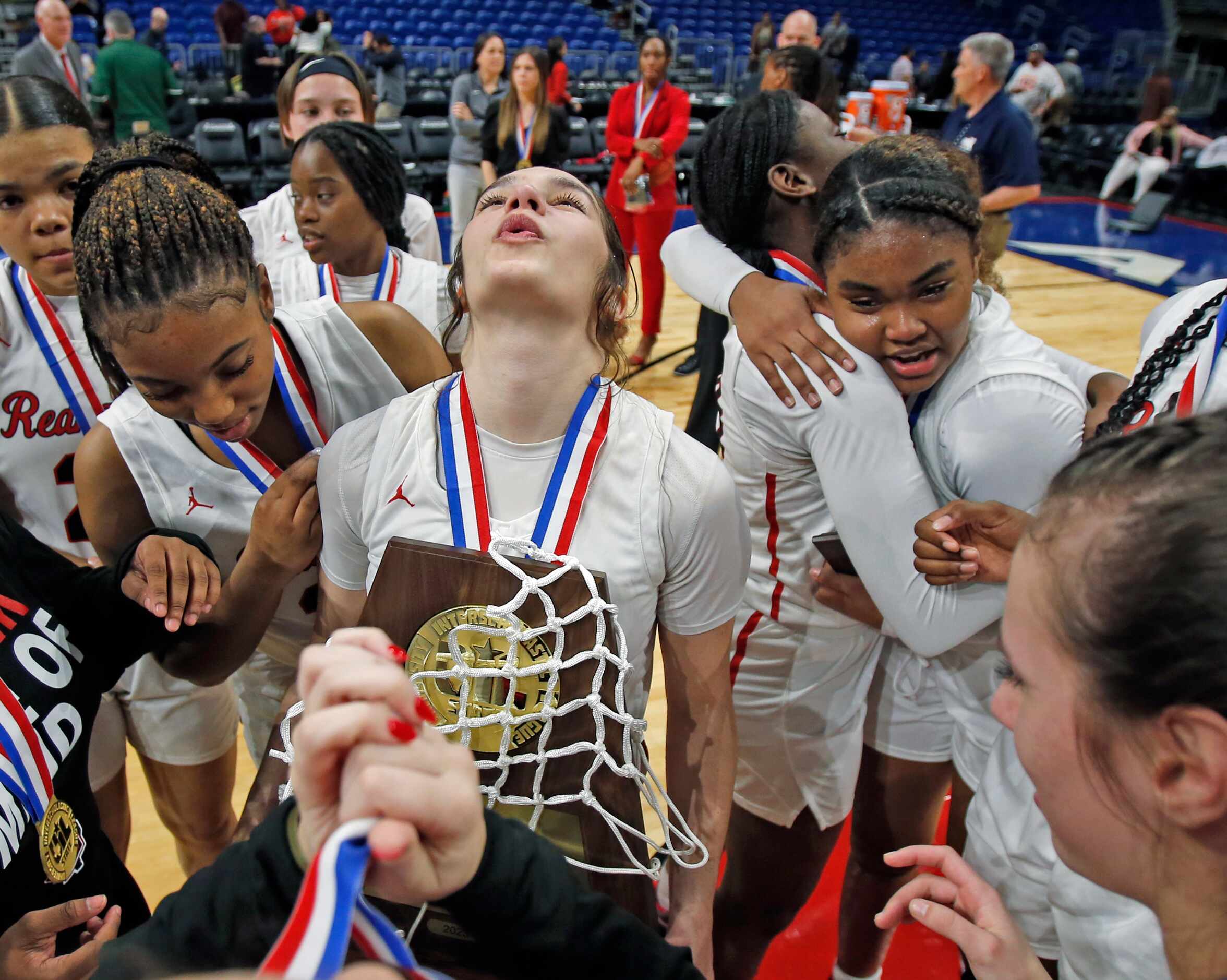 Frisco Liberty Jezelle Jolie Moreno (0) holds up their trophy as they Frisco Liberty...