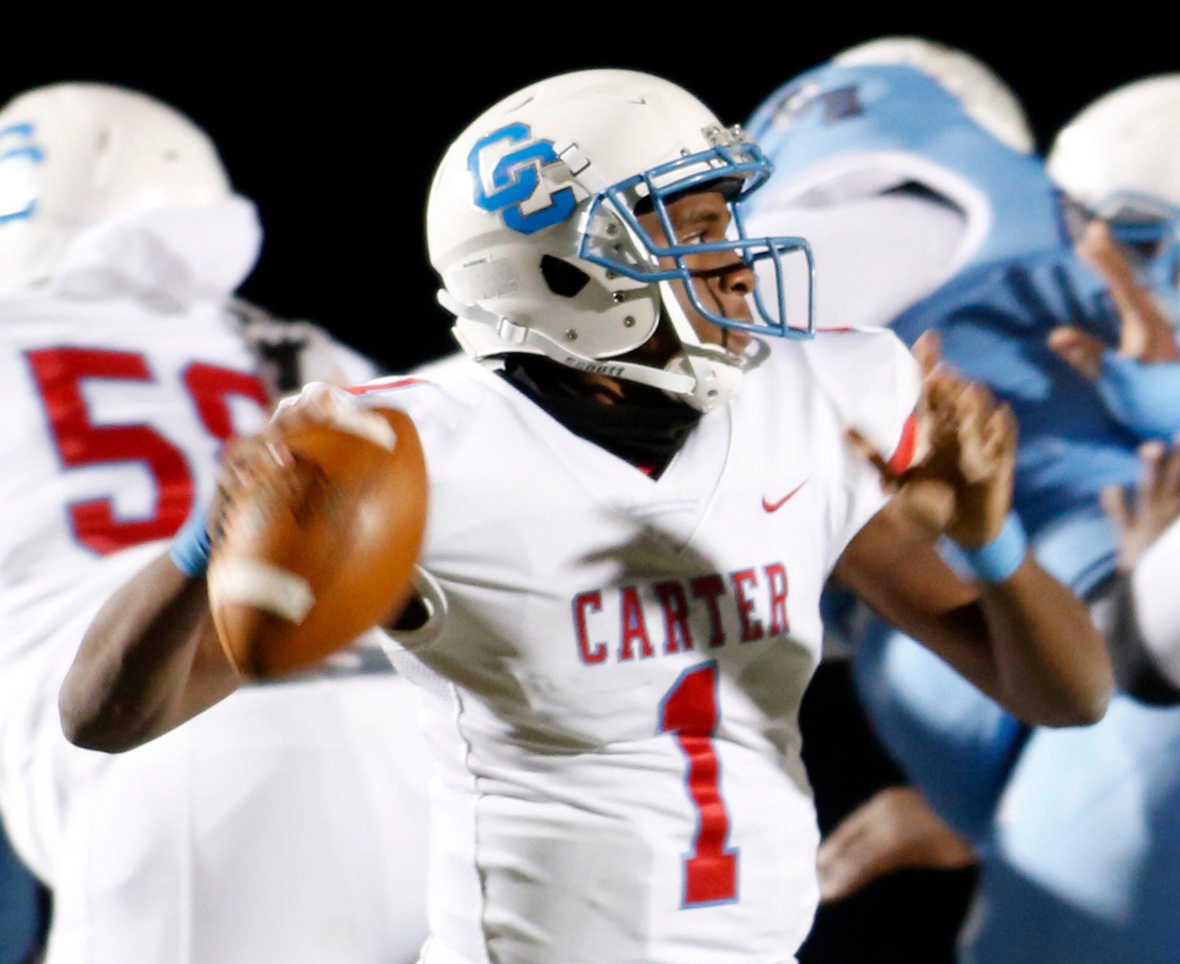 Dallas Carter quarterback Kace Williams (1) prepares to deliver a pass from the pocket...