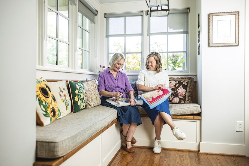 Metheny and her mother share a laugh as they work on their current projects.