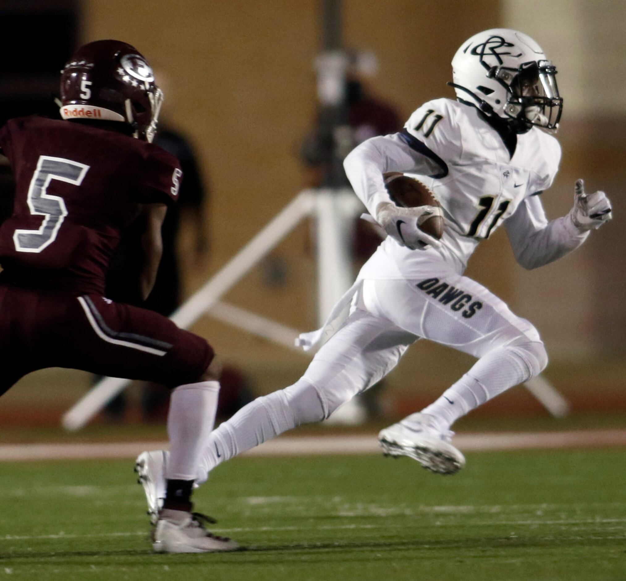 Royse City special teams member Damon Dozier (11) pulls away from Ennis defender Stephon...