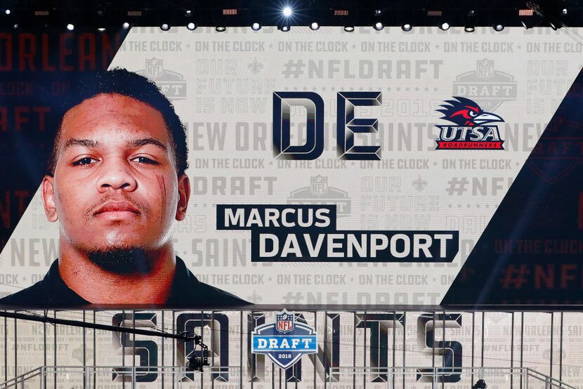 ARLINGTON, TX - APRIL 26:  A video board displays an image of Marcus Davenport of UTSA after...