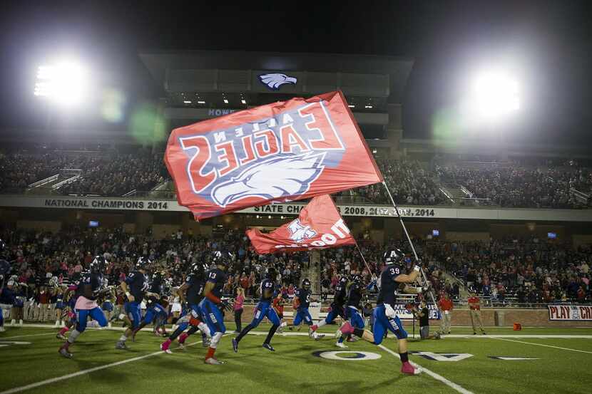 Allen players take the field to face Hebron in a high school football game at Eagle Stadium...
