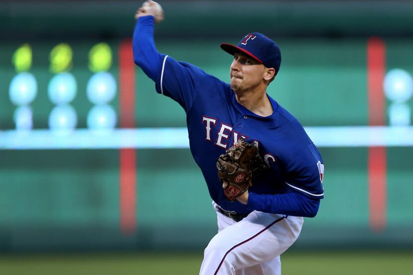Texas Rangers relief pitcher Tanner Scheppers (52) throws against the Quintana Roo Tigers of...