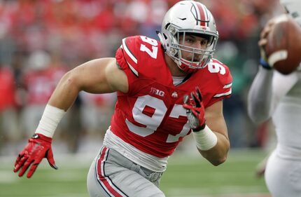 Ohio State defensive lineman Joey Bosa plays plays against Northern Illinois.