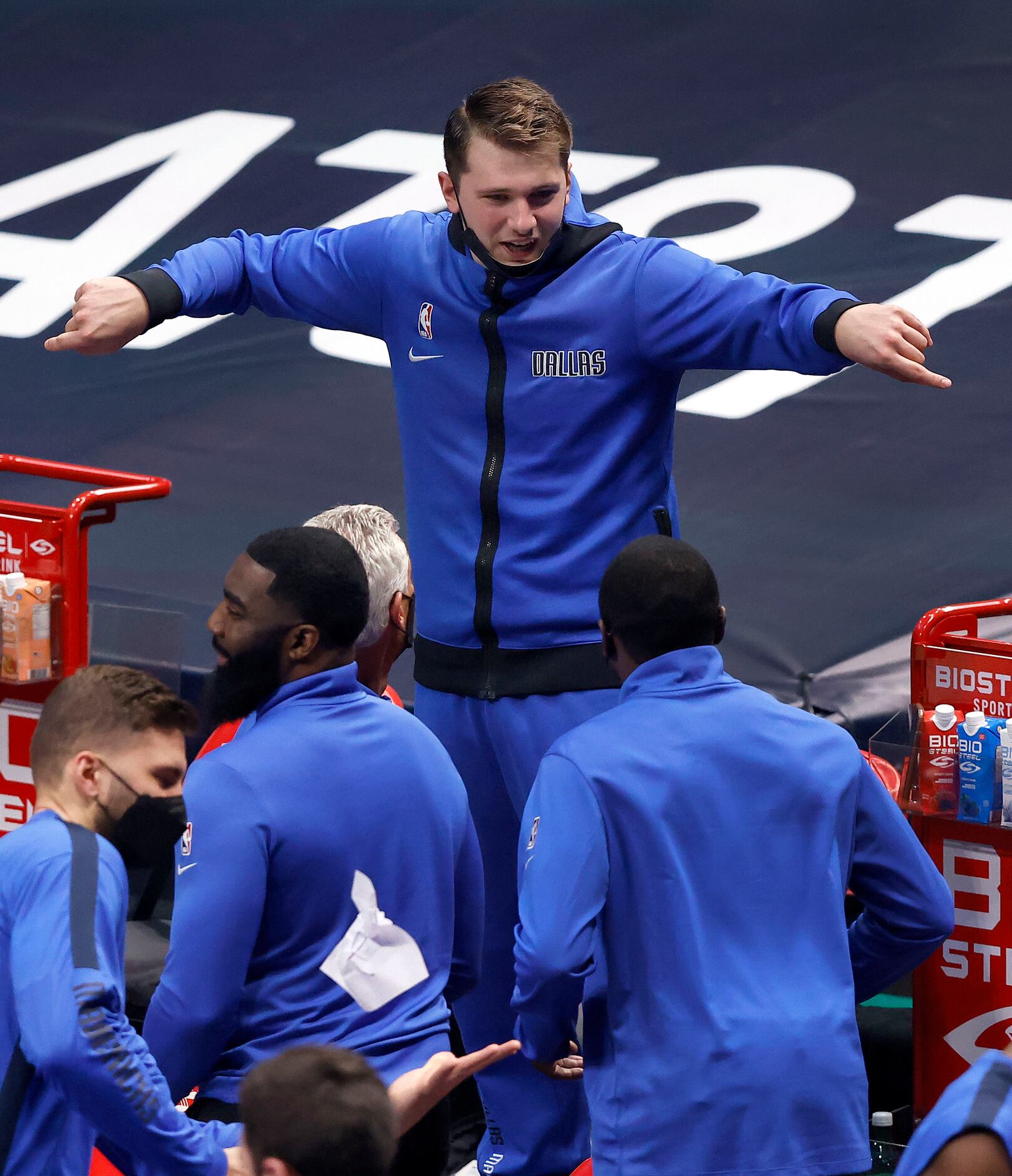 Dallas Mavericks guard Luka Doncic (77) dances to the music in his seat during a fourth...