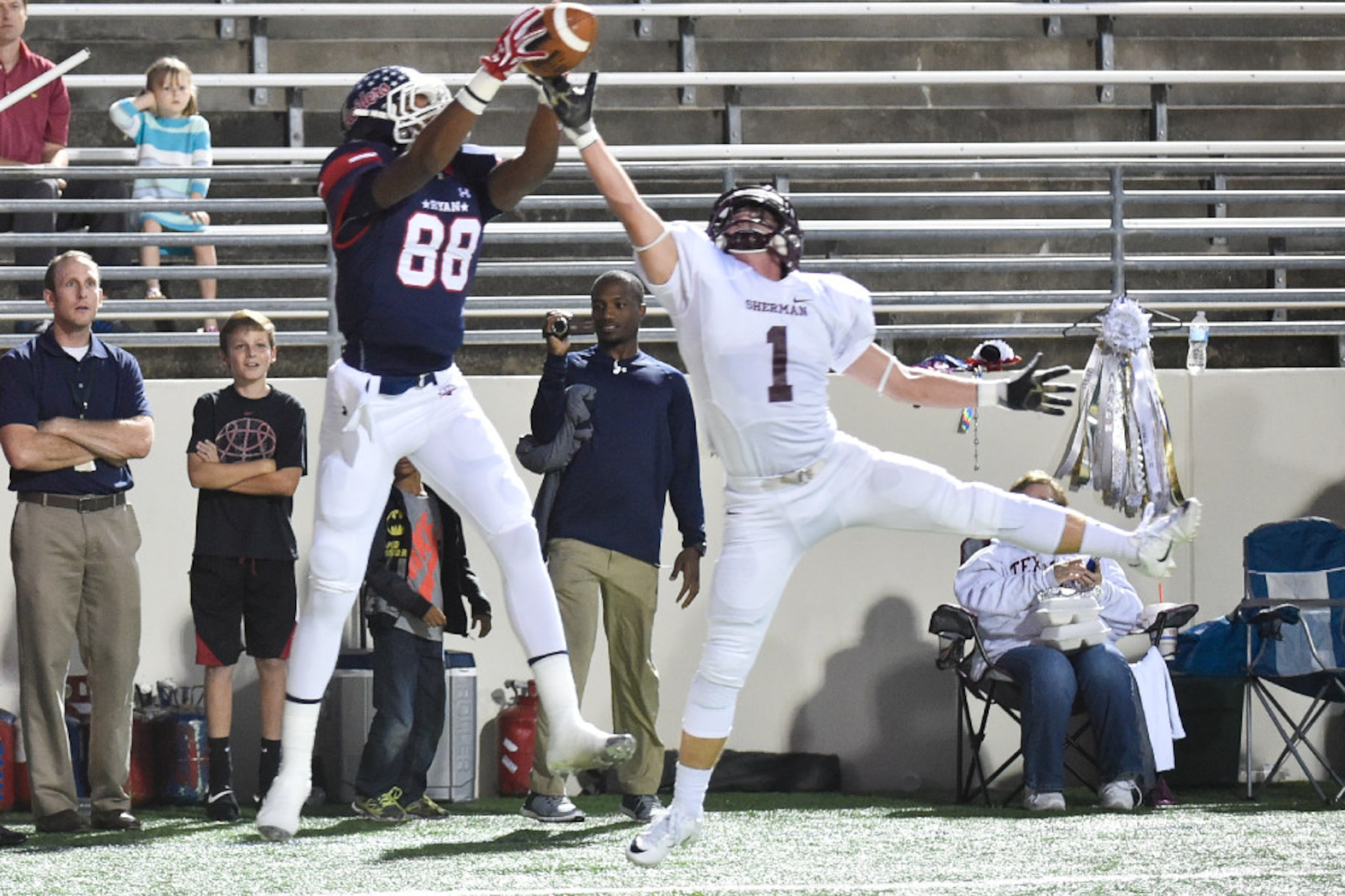 Ryan junior wide receiver Chritauskie Dove (88) makes a catch and scores a touchdown, while...