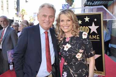 FILE - Pat Sajak, left, and Vanna White, from "Wheel of Fortune," attend a ceremony honoring...