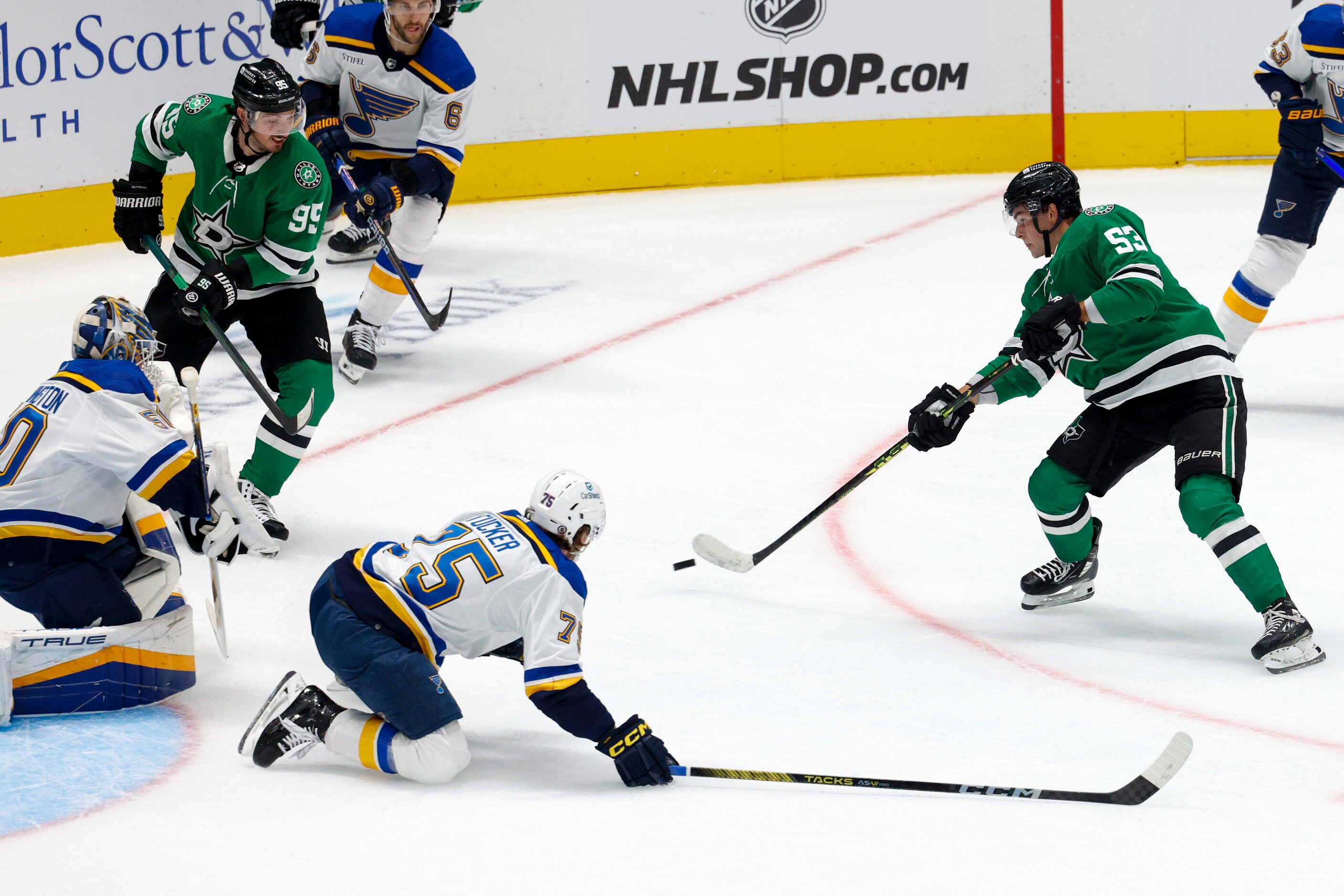 Dallas Stars center Wyatt Johnston (53) shoots the puck towards St. Louis Blues goaltender...