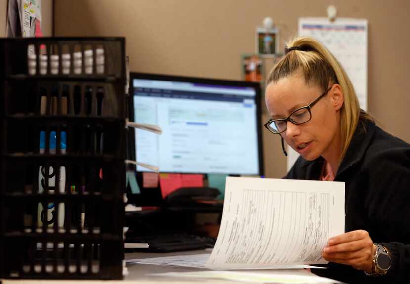 Jessica Hefley works on scheduling in the central scheduling office at Methodist Hospital...