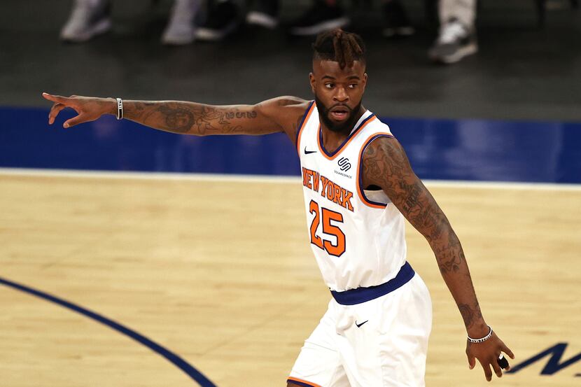 Reggie Bullock (25) of the New York Knicks celebrates his three point shot in the first...