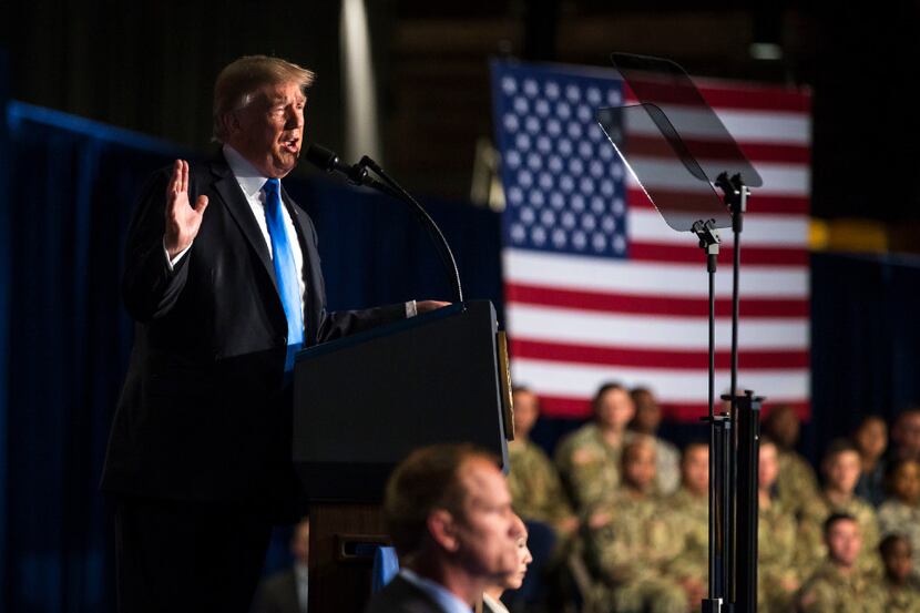 President Donald Trump delivers an address to the nation at Fort Myer in Arlington, Va.,...