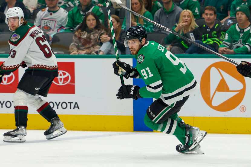 Dallas Stars center Tyler Seguin (91) skates back on defense during the first period of an...