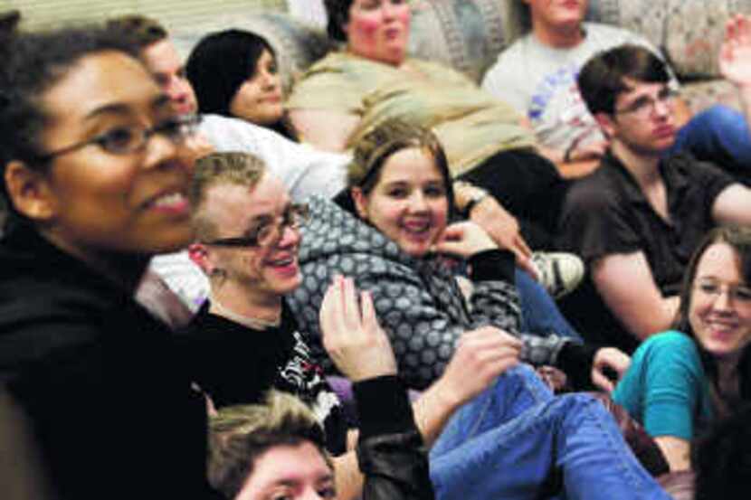  Charley Scarborough (in glasses) is the center of attention during a group session at Youth...