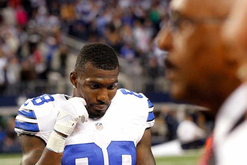 Dallas Cowboys wide receiver Dez Bryant (88) reats to his late game catch being ruled...