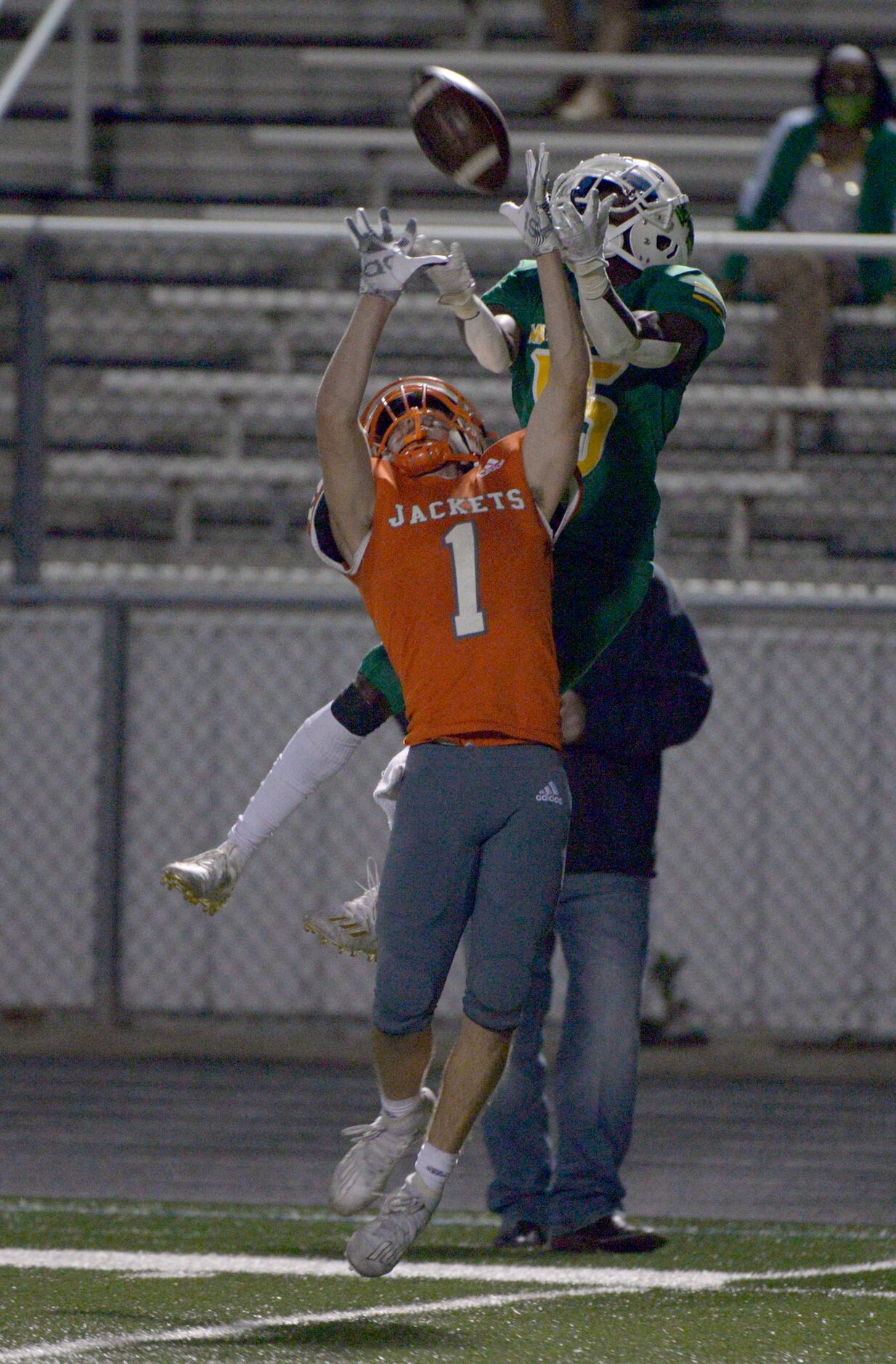 Madison’s Avery Fulce breaks up a pass intended for Mineola’s Thomas Hooton (1) in the third...
