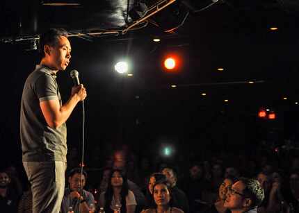 Stand-up comedian Peng Dang performs in front of an audience, pre-pandemic.