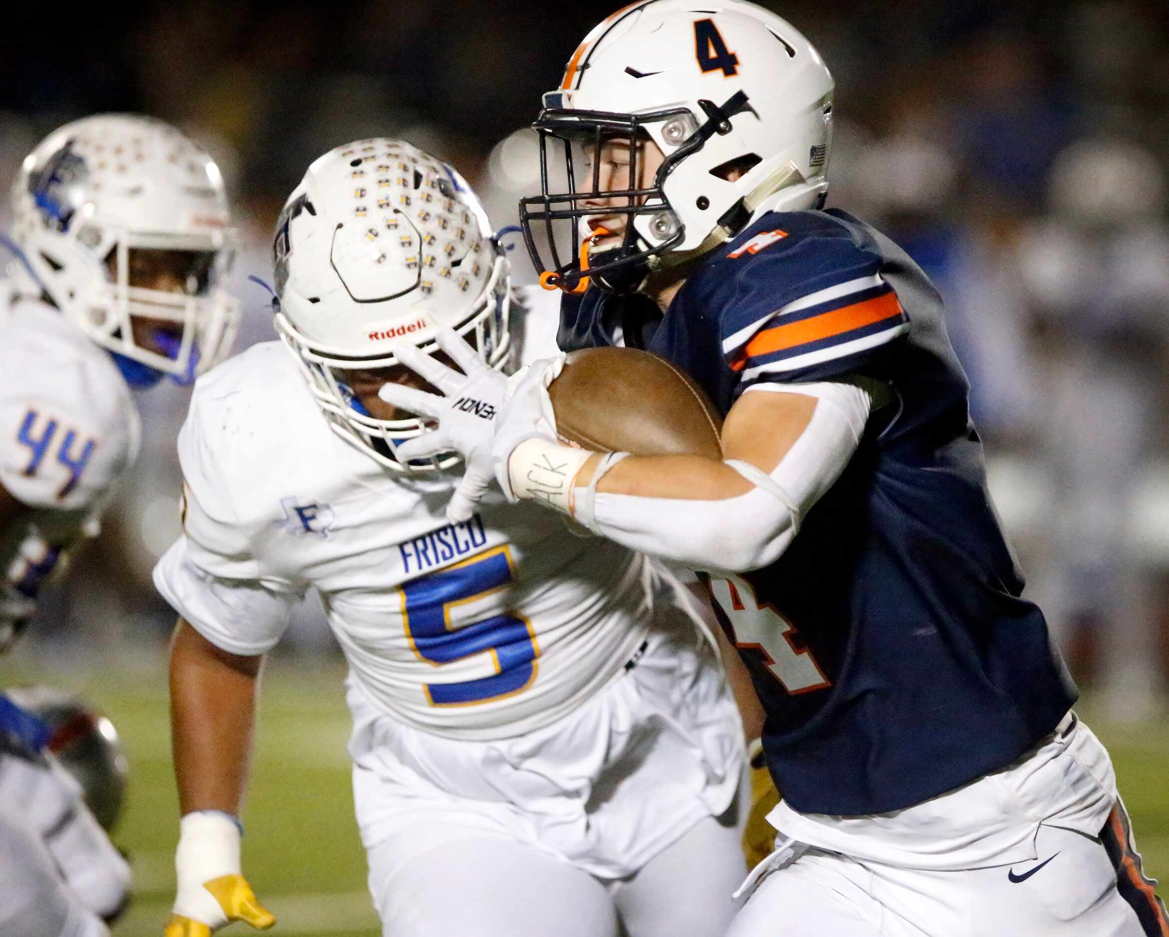 Wakeland High School running back Cooper Snyder (4) is chased by Frisco High School...