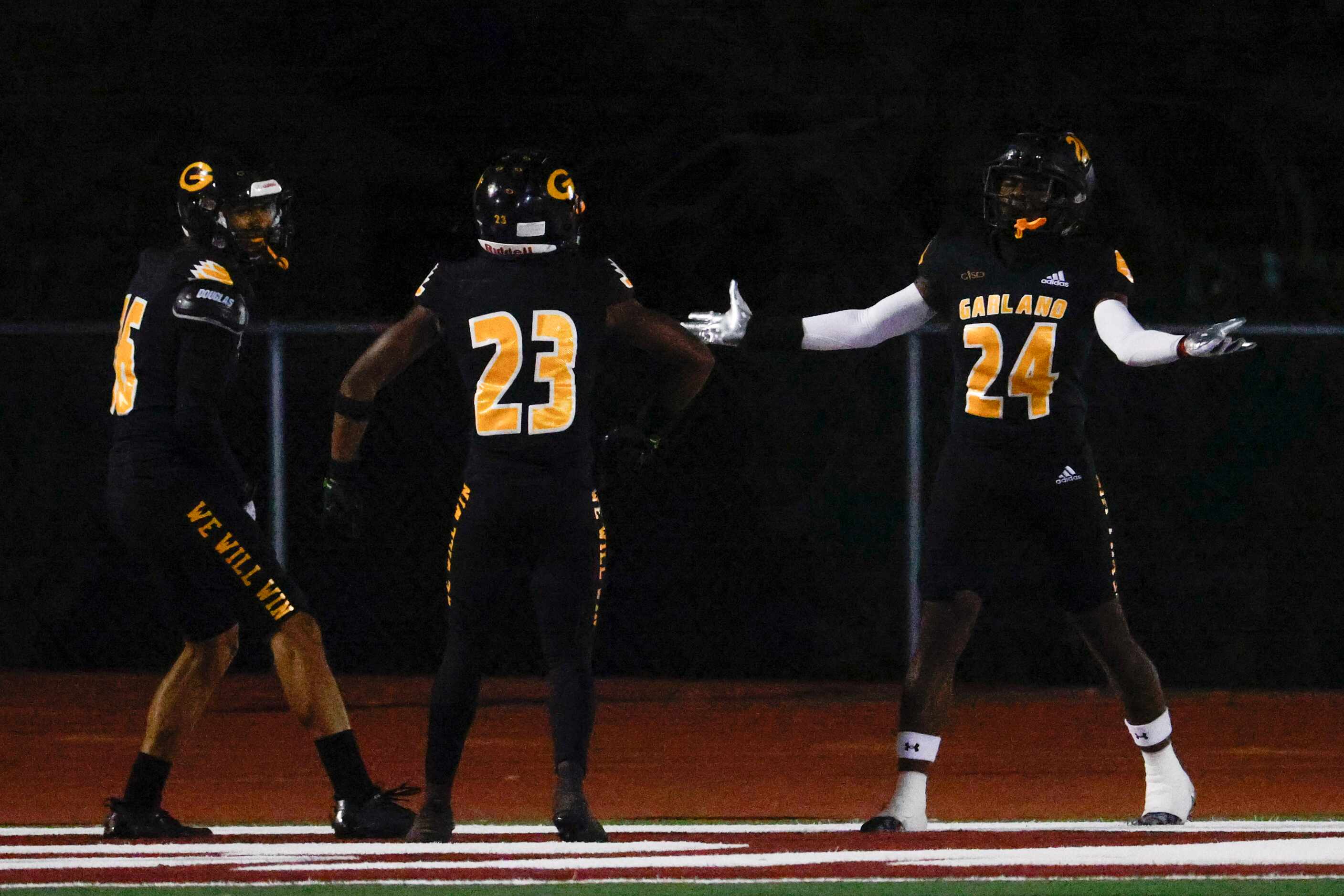 Garland high school’s Terrence Greene (24) celebrates a touchdown against Sachse during the...