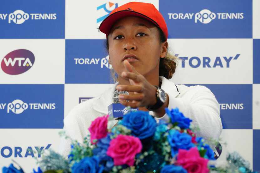 U.S. Open women's singles champion Naomi Osaka gestures during a press conference prior to...