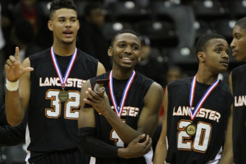 Lancaster guard Kaelon Wilson (4) was all smiles after being named tournament Most Valuable...