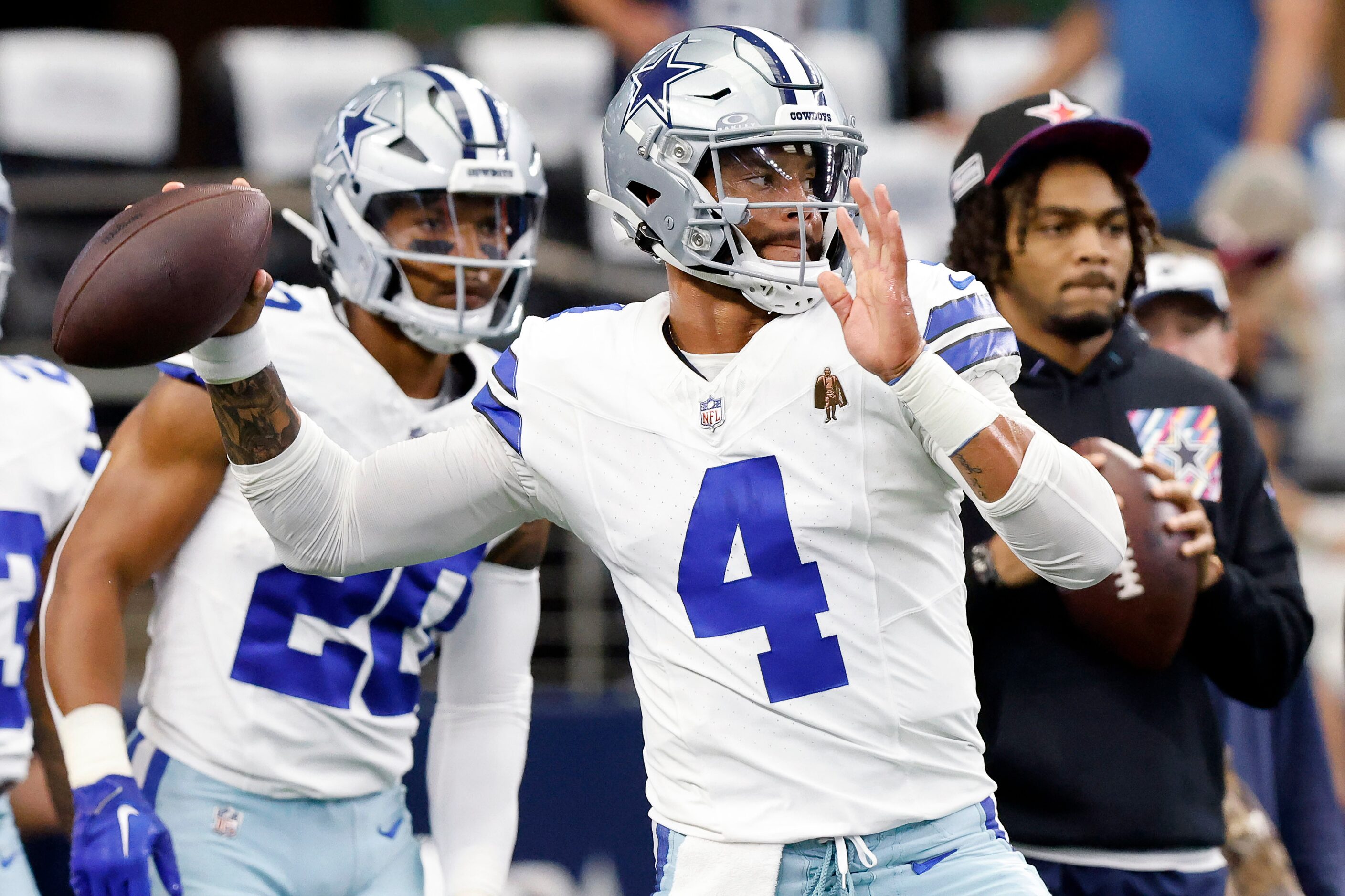 Dallas Cowboys quarterback Dak Prescott (4) throws the ball during pregame warmups before...