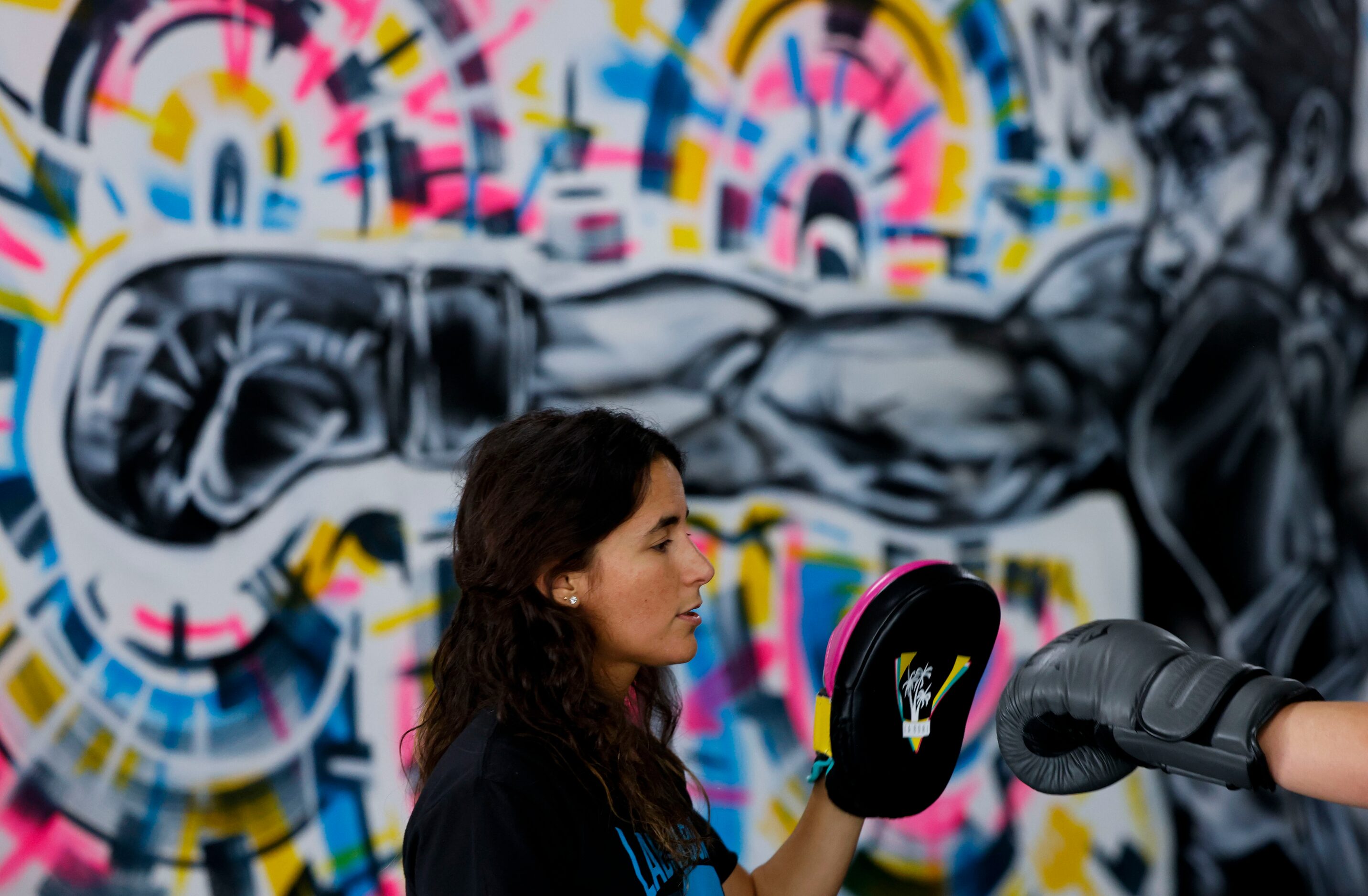 Amanda Alvarez, a salsa teacher and boxing lover, leads a boxing training on Tuesday, May 2,...