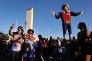 Crowds fill Big Tex Circle to take selfies with the larger-than-life cowboy and the Tower...