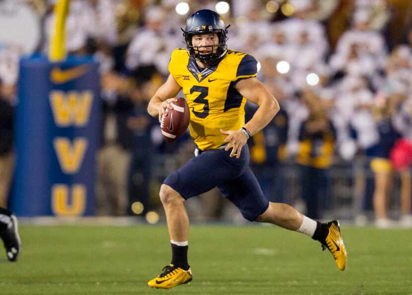 Oct 10, 2015; Morgantown, WV, USA; West Virginia Mountaineers quarterback Skyler Howard...