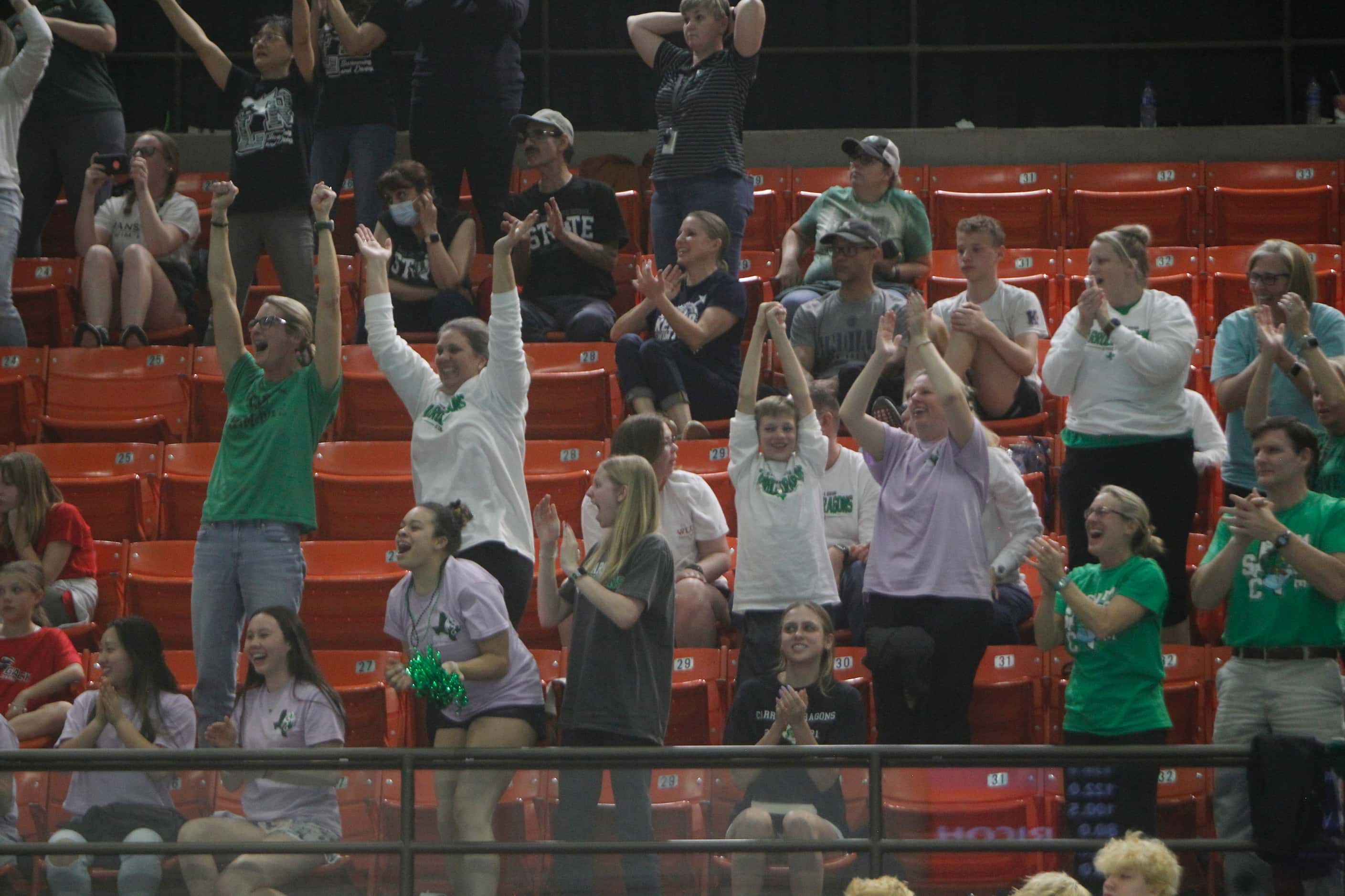 Southlake Carroll fans react after The Dragons won a race which led to a first place overall...