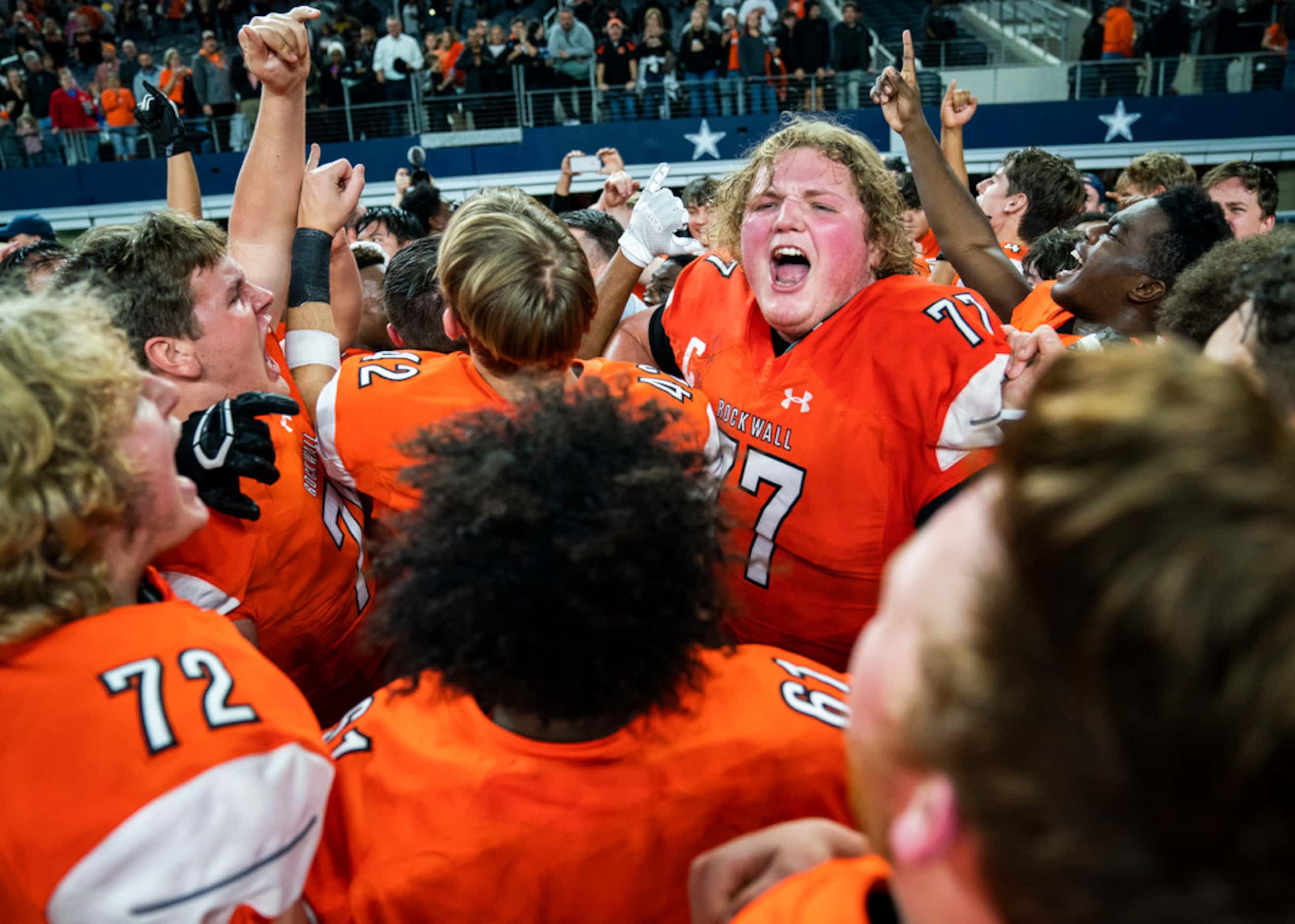 Rockwall celebrates a 60-59 win over Allen in a Class 6A Division I area-round high school...