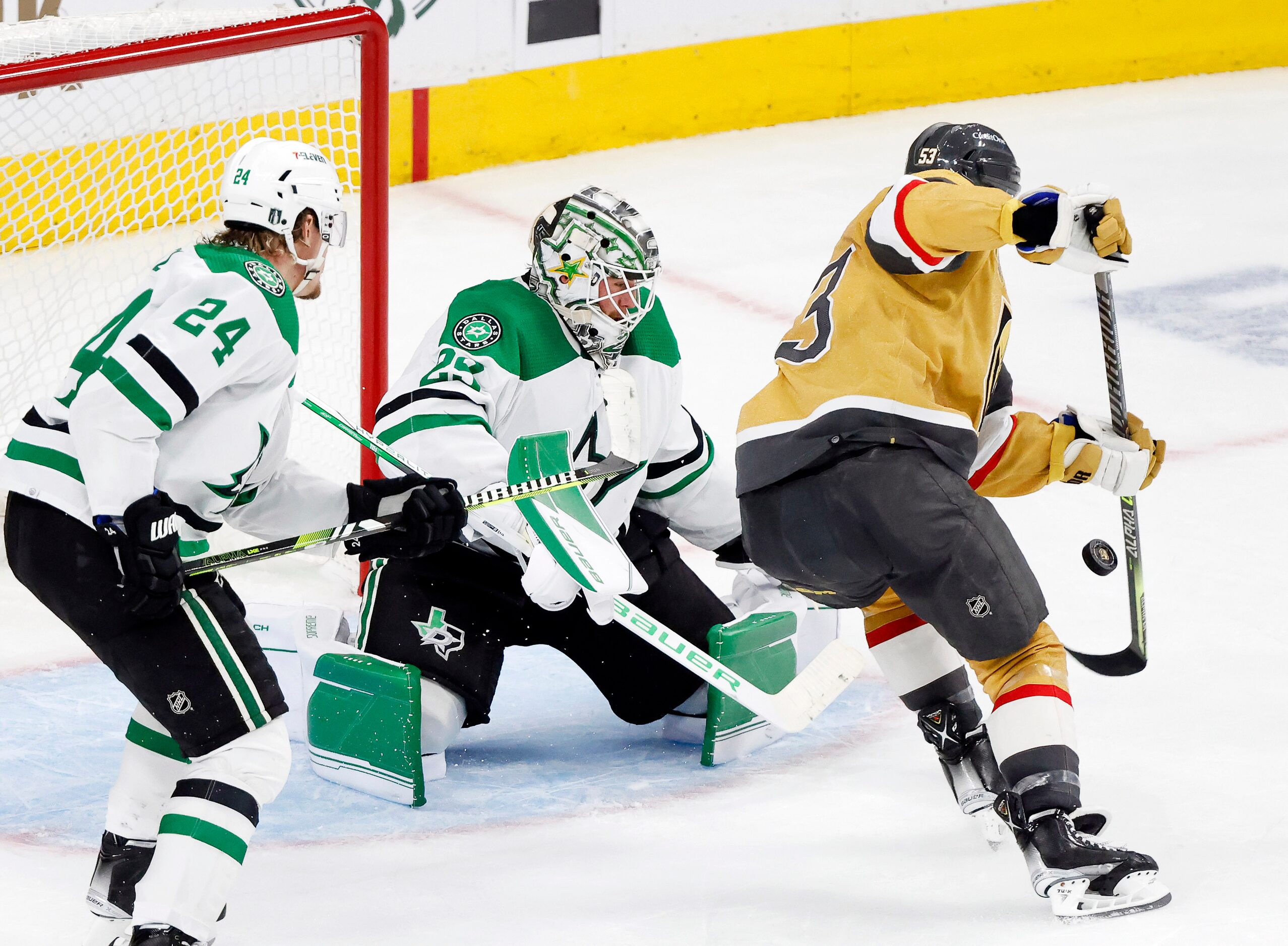 Vegas Golden Knights center Teddy Blueger (53) tries to tip a shot past Dallas Stars...