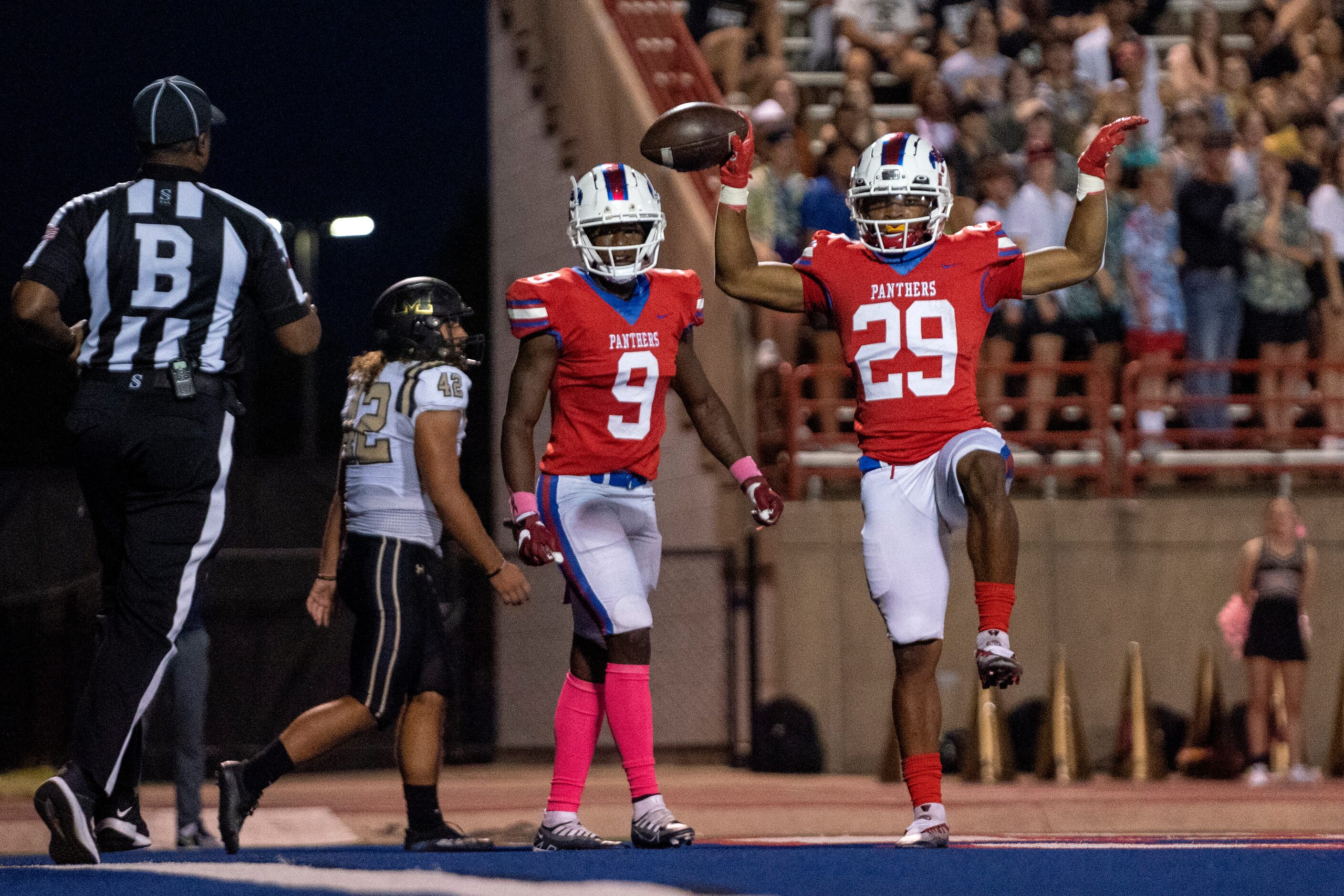 Duncanville junior running back Caden Durham (29) celebrates after running for a touchdown...