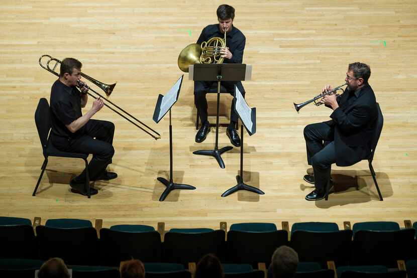 From left: Barry Hearn (trombone), Kevin Haseltine (horn) and Russell Campbell (trumpet)...