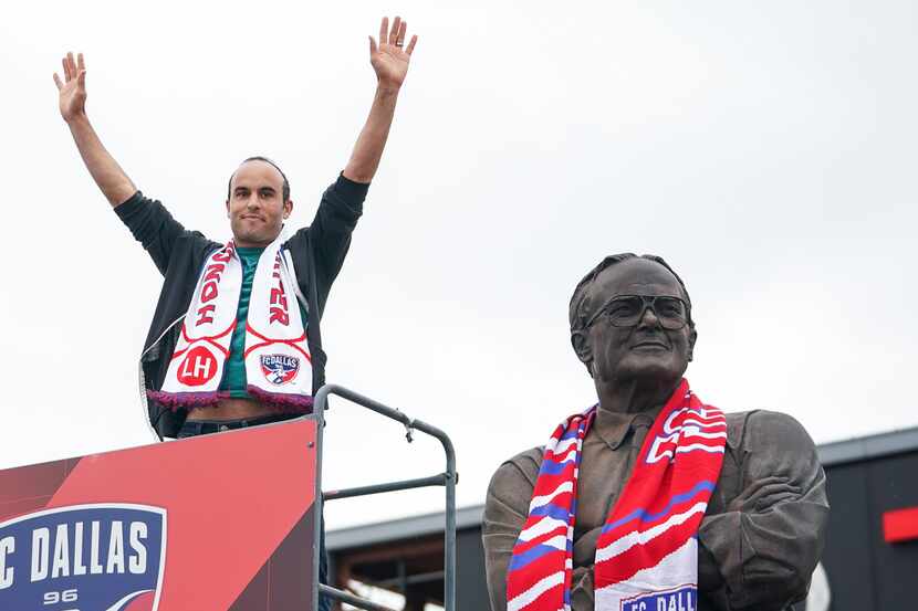 Former US Soccer star and current Dan Diego Socker Landon Donovan scarfs the Lamar Hunt...