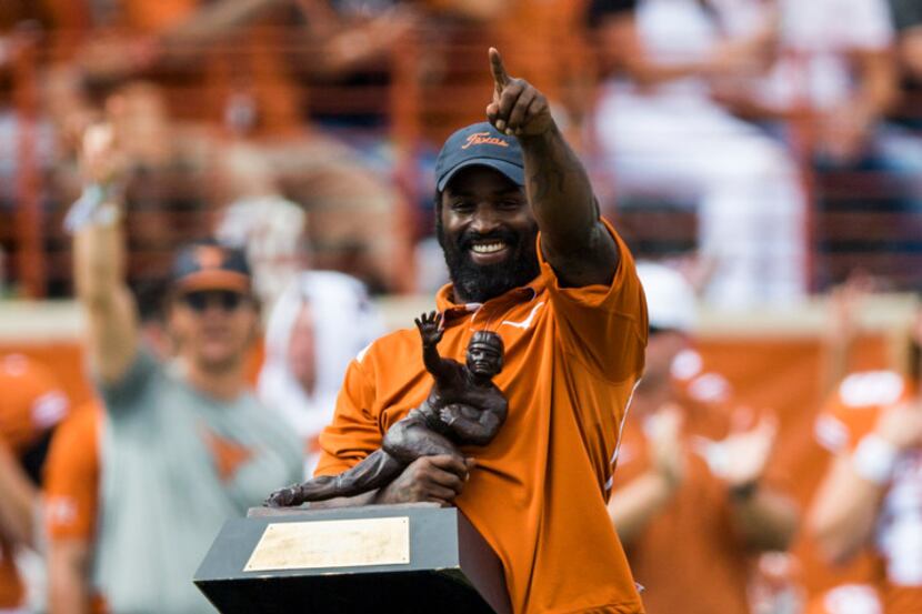 Former Texas Longhorn Ricky Williams is introduced on the field during the first quarter of...