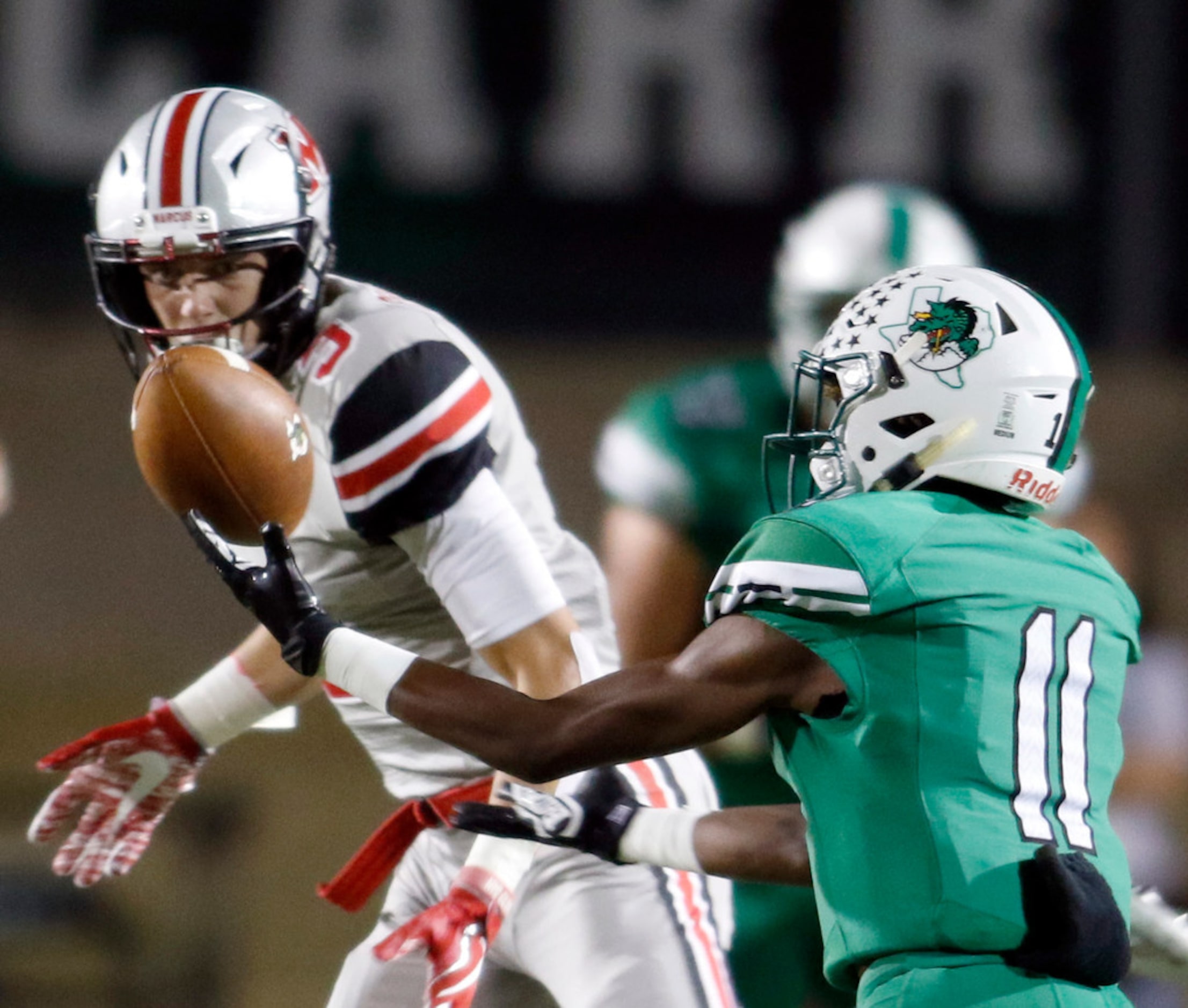 Southlake Carroll receiver Darryl Crockett (11) reaches but is unable to pull in a second...