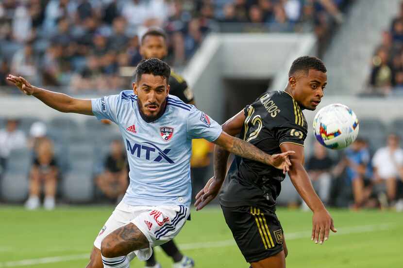 FC Dallas forward Jesus Ferreira, left, and Los Angeles FC defender Diego Palacios (12) vie...