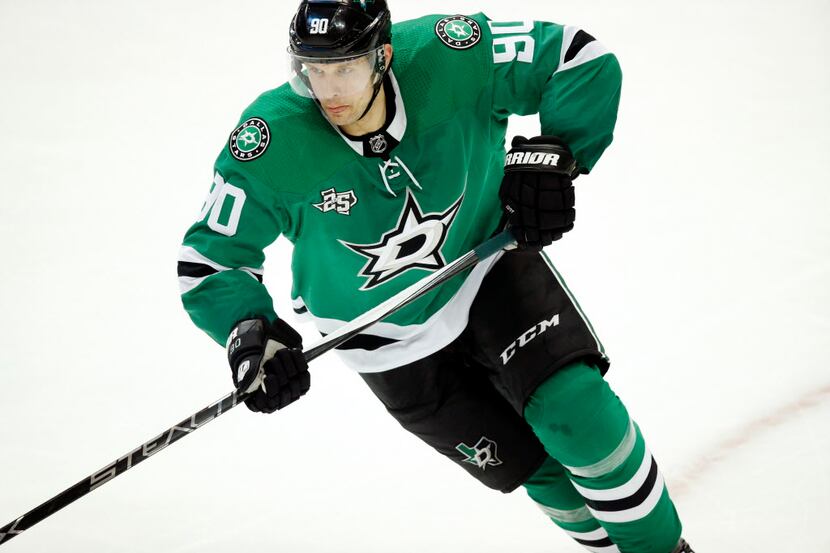 Dallas Stars center Jason Spezza (90) turn and skates up ice during the third period against...