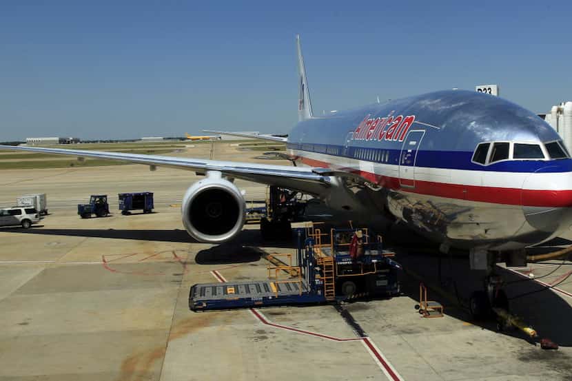 An American Airlines Boeing 777-200 airplane sits on the tarmac on Wednesday, May 9, 2012 at...