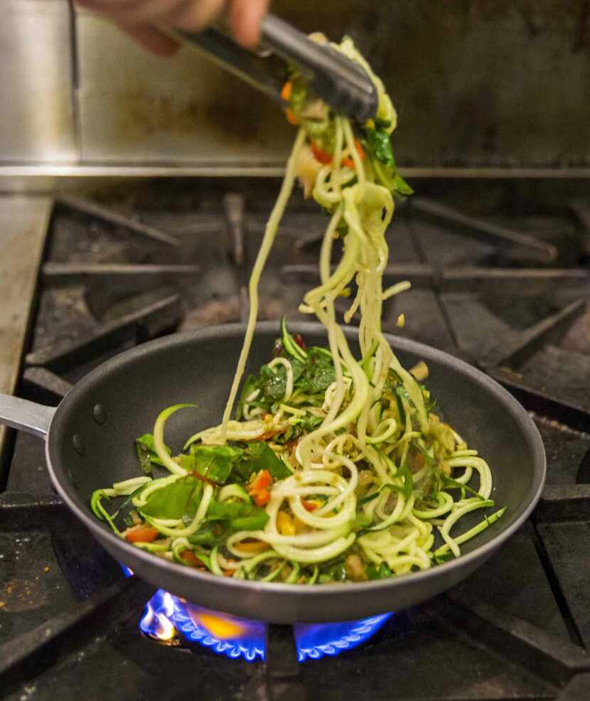 
Zucchini,  which sautés quickly, is a good choice for a first try at spiralizing. 


