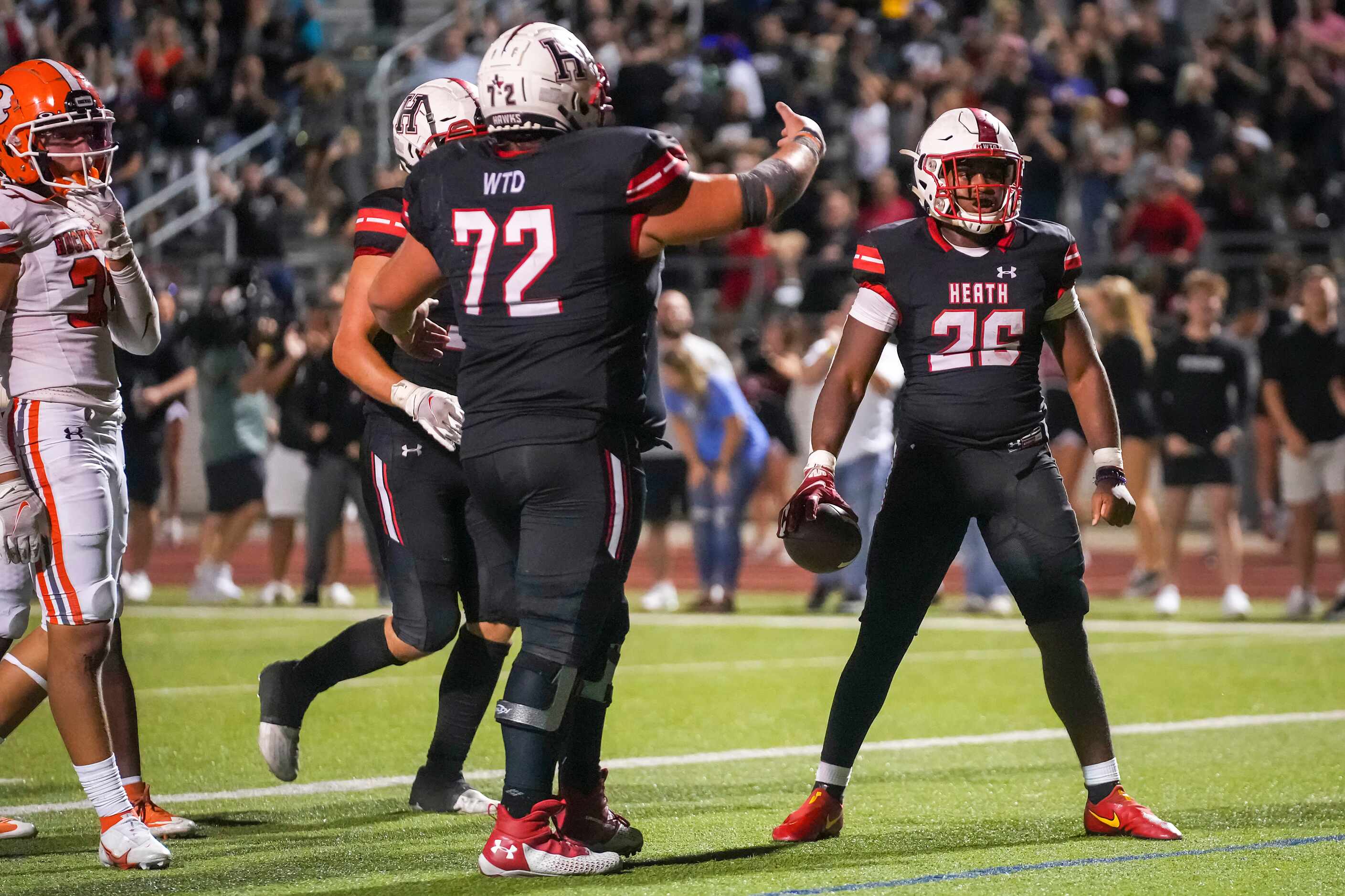 Rockwall-Heath running back  Zach Evans (26) celebrates after scoring the game-winning...