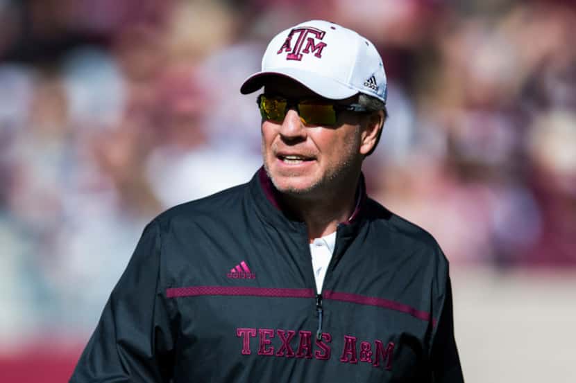 Texas A&M Aggies head coach Jimbo Fisher stands on the field during a Texas A&M University...