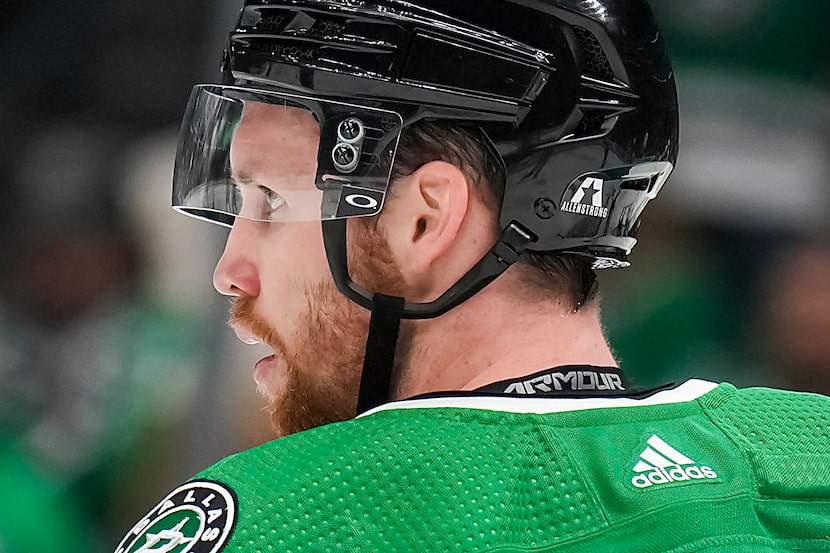 Dallas Stars center Radek Faksa wears a helmet with a sticker reading “Allen Strong” during...