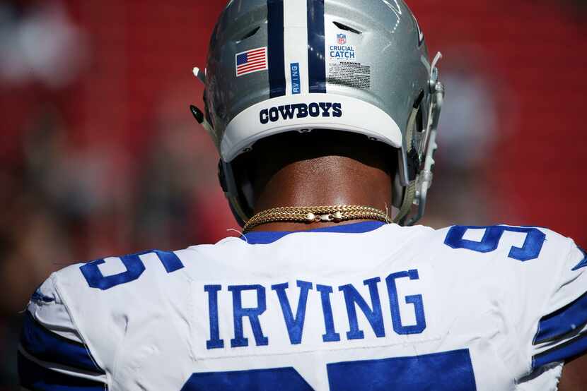Dallas Cowboys defensive tackle David Irving (95) warming up before a National Football...