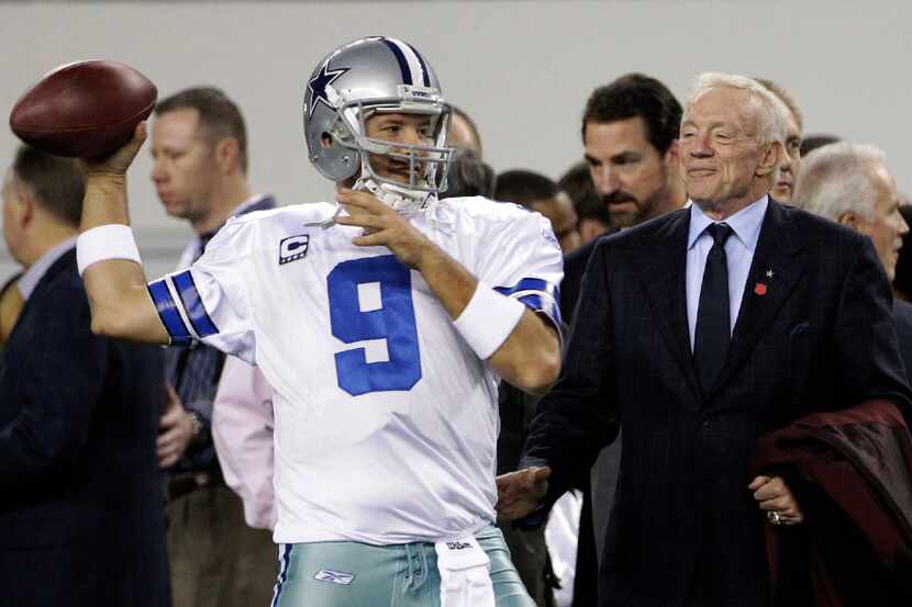 FILE - In this Sunday, Dec. 11, 2011 file photo, Dallas Cowboys owner Jerry Jones, right,...